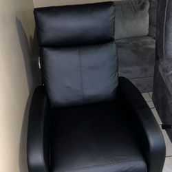 Black reclining massage chair 
