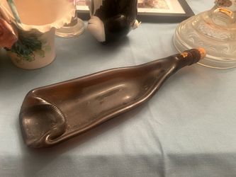 Wine bottle spoon holder