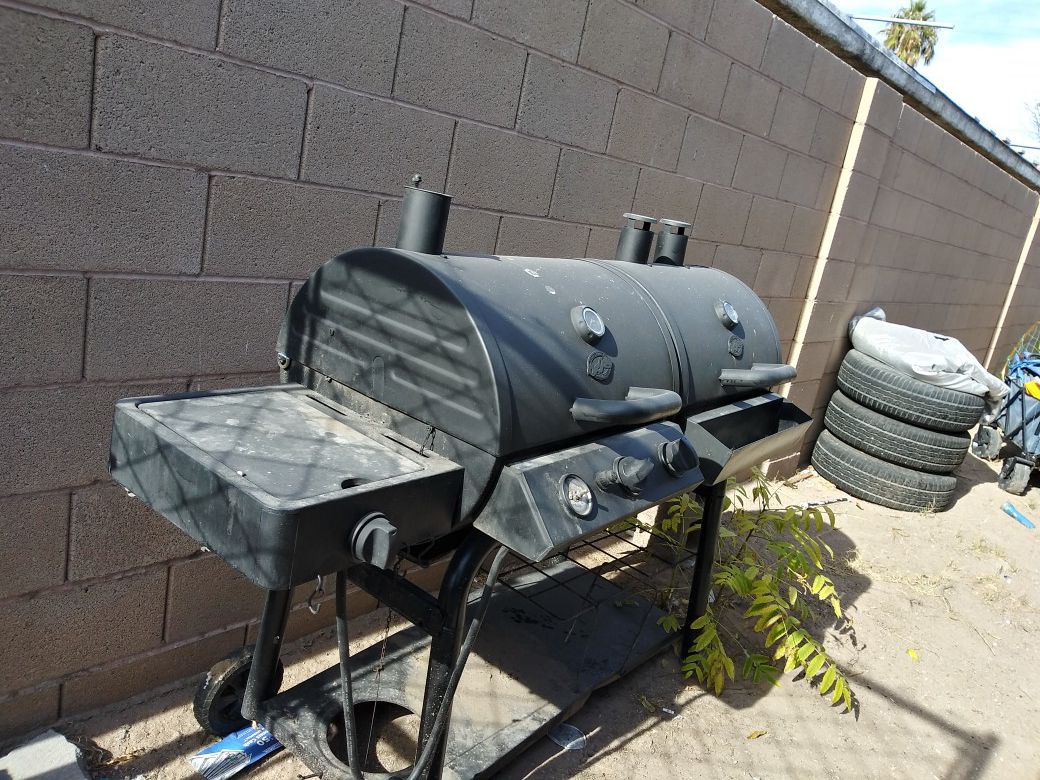 Selling my Barrel BBQ Pit with smoker and Grill set up for propane or charcoal