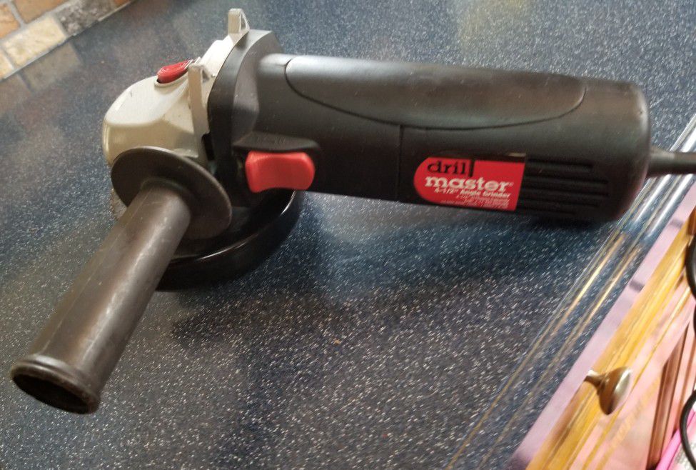 ANGLE GRINDER ELECTRIC, DRILL MASTER 4 1/2" ....USED GOOD CONDITION