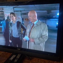 50 In Sharp TV And DVD Player Both Have Remotes 