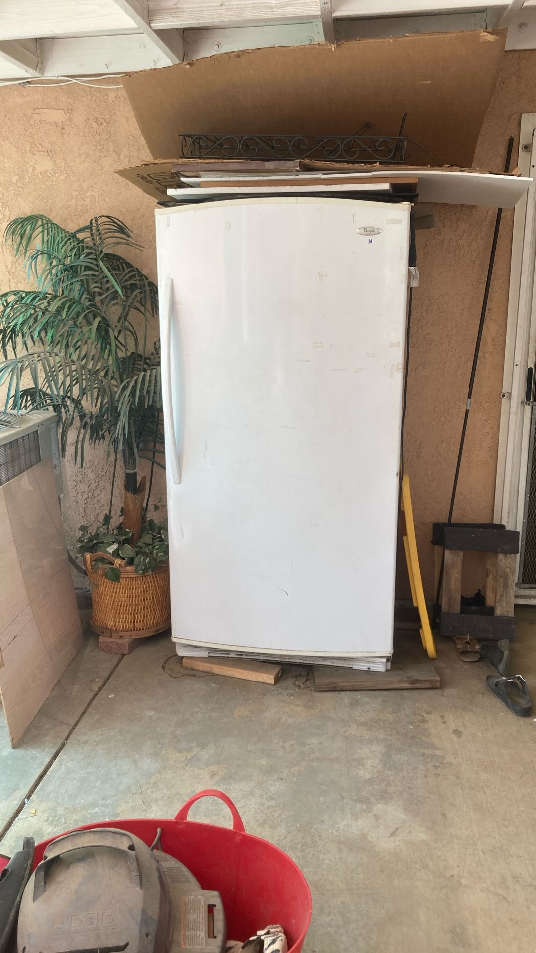 Whirlpool standup freezer good condition moving don’t need anymore