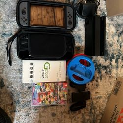 Nintendo switch (1st Edition) With Docking Station, Glass Protectors, Mario kart 8 And Controllers
