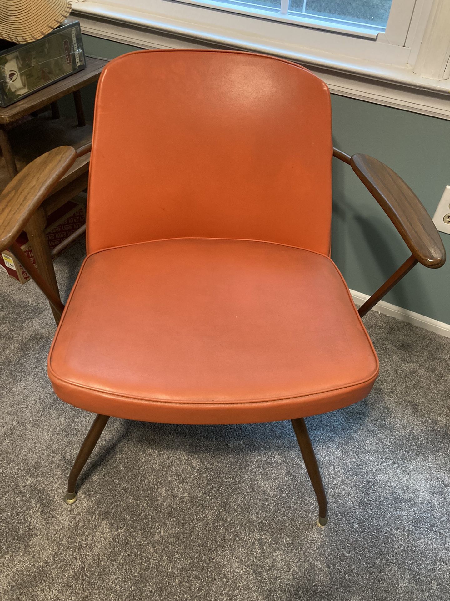 Vintage Mid-century modern pair of orange swivel chairs 