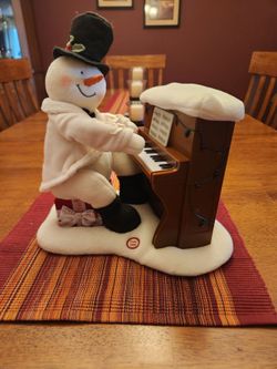 Gently Used Hallmark  Snowman Playing the Piano. Great Condition