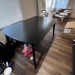 Black oval table