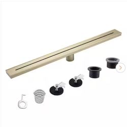 24 Inch Stainless Steel Linear Shower Drain with Square Pattern Drain Cover in Gold