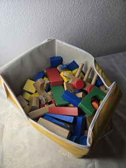 Kids play wood blocks .motor skills