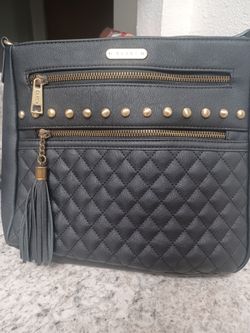 NEW CROSSBODY BAG .