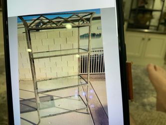 Nice decorative shelf with glass very heavy.