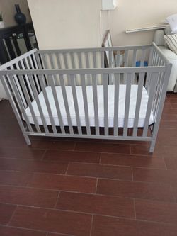 Beautiful grey mini crib