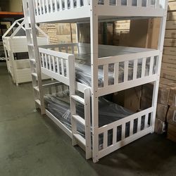 Triple bunk bed. Available in white & espresso. Assembly required. Assembly not included. Taxes included. Free delivery.  Bunk bed only-$450 Bunk bed