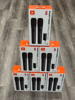 New JBL PartyBox Wireless Mic set comes with two digital wireless microphones and a plug-and-play receiver. This black microphone system has a 20-hour