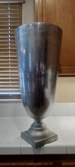 Large, silver-toned aluminum trophy vase urn classic chalice-like body mounted on a stepped square base