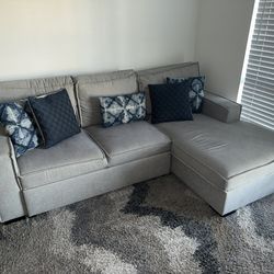 Light Grey sofa w/ Pull Out Bed And Chaise