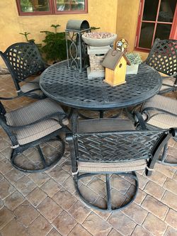 set of outdoor table and chairs