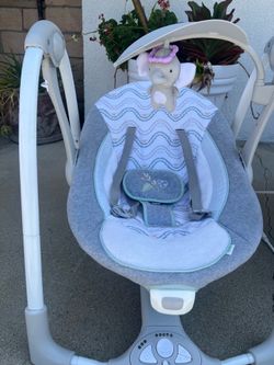 Musical baby swing