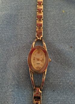 Silver tone watch and band