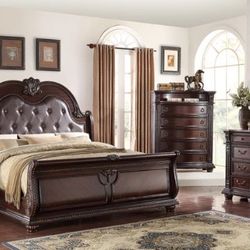 Stanley Cherry Brown Upholstered Sleigh Bedroom Set