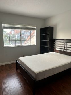 Black bookshelf by Plummers, like new condition