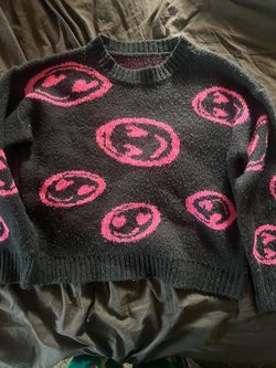 Pink smiley face sweater