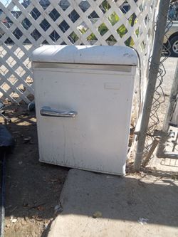 Vintage White Refrigerator with Chrome Handle