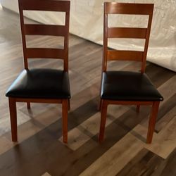 Brown Chair With Black Leather Seating