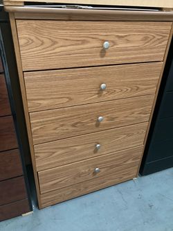 Compressed wood dresser