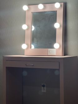 Pink vanity with 7 lights