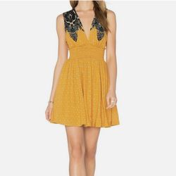 Brand new woman’s Free People brand golden yellow “walking through my dream” dress up for sale 