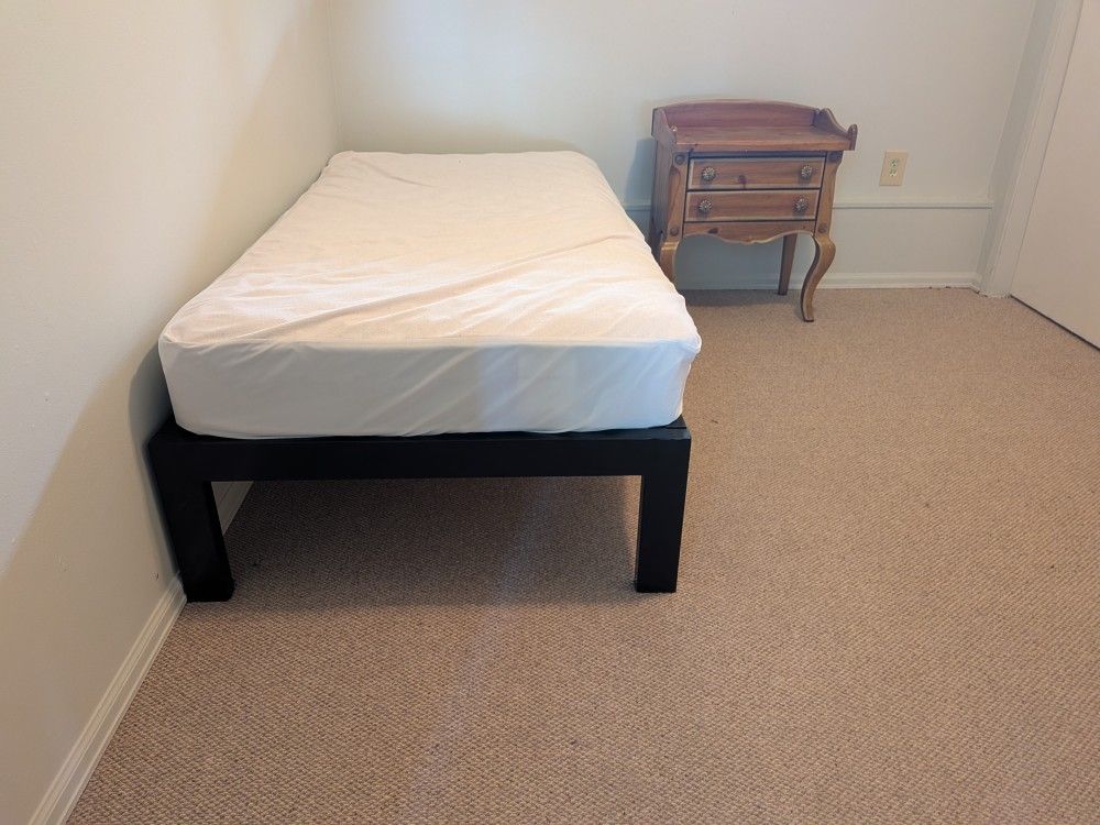 Black Metal Twin Bed With Rolling Trundle