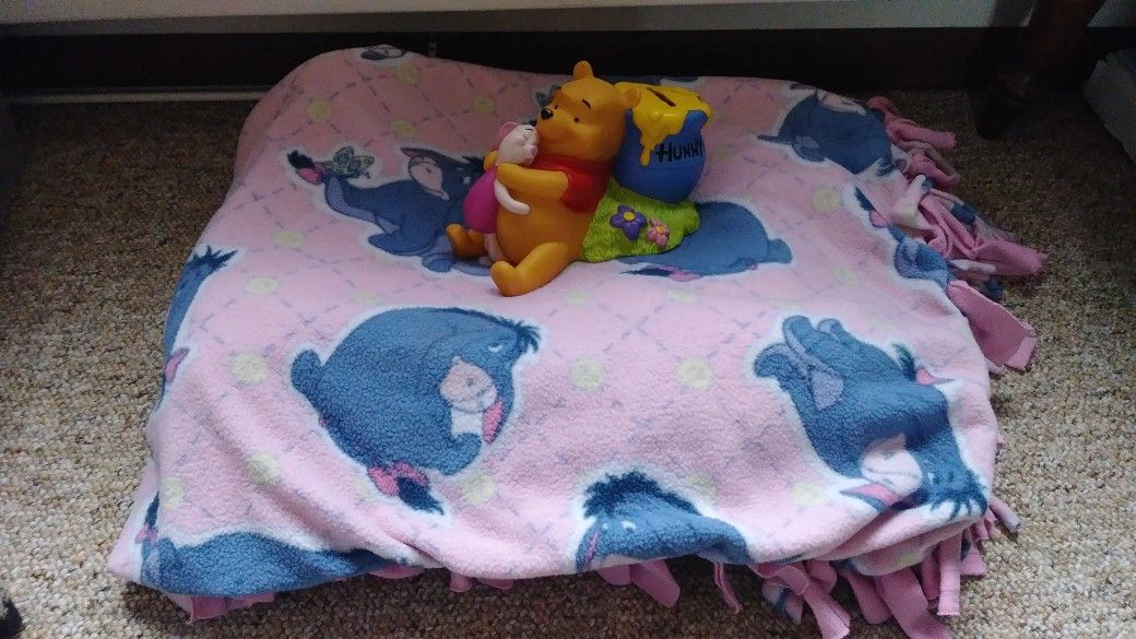 Eeyore blanket and pooh piggy bank