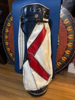 Vintage Dunlop leather Red White and Blue golf carry bag. All zips work. Fair cond. as is pick up dlv.