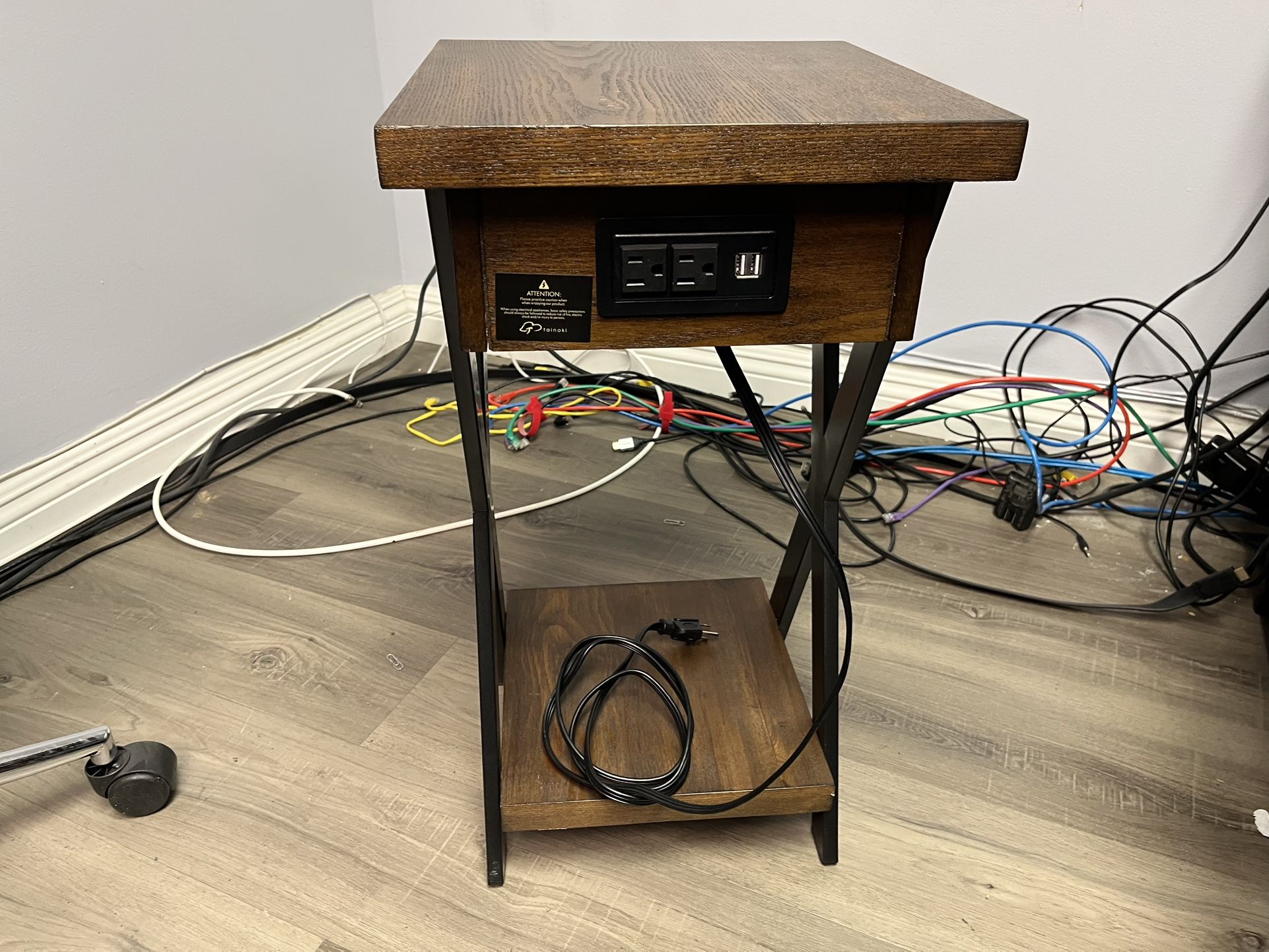 End table with electric outlet access. 