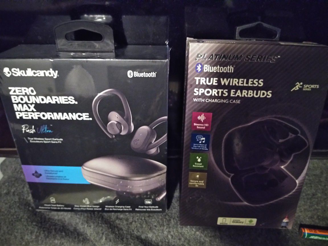 Brand new wireless headphones one is skull candy other regular sports ear buds both loud