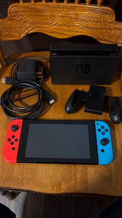 Nintendo Switch with joy cons, dock, cords
