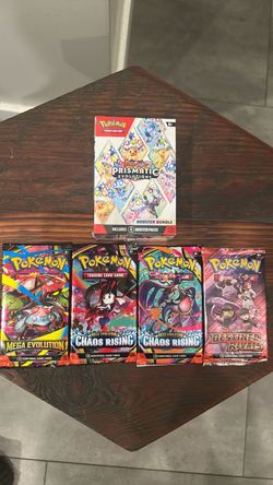 Prismatic bundle, 2 chaos rising packs, 1 destined rivals pack, 1 mega evolutions pack