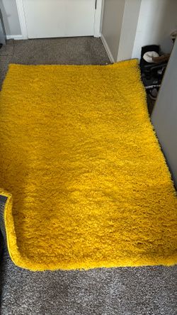 Yellow area rug