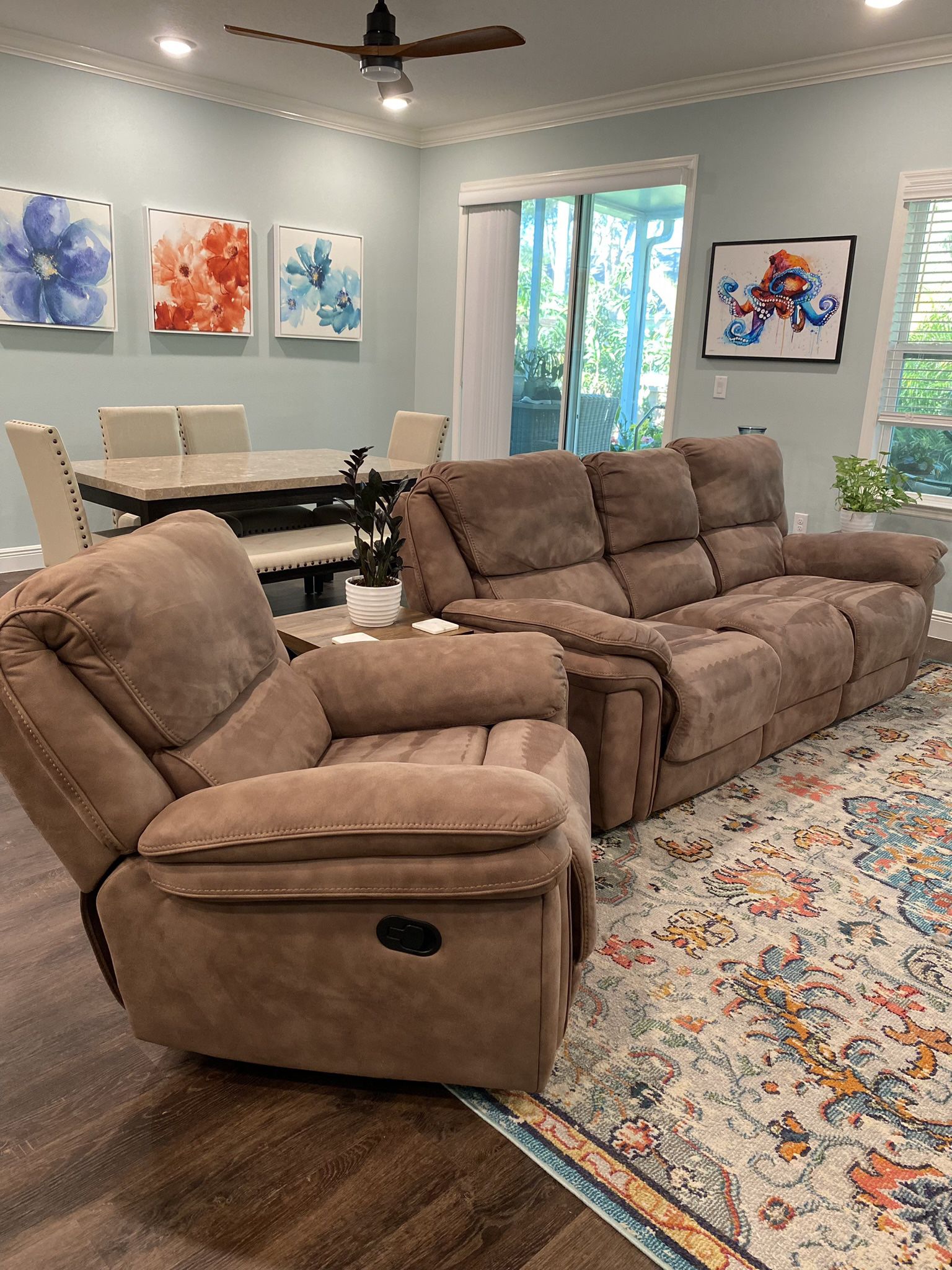 Reclining Sofa, Recliner, Two End Tables And A Coffee Table