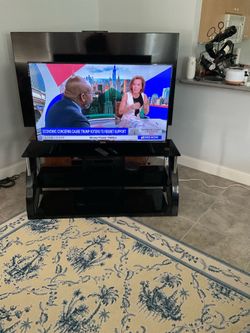 50 inch tcl tv w/ stand