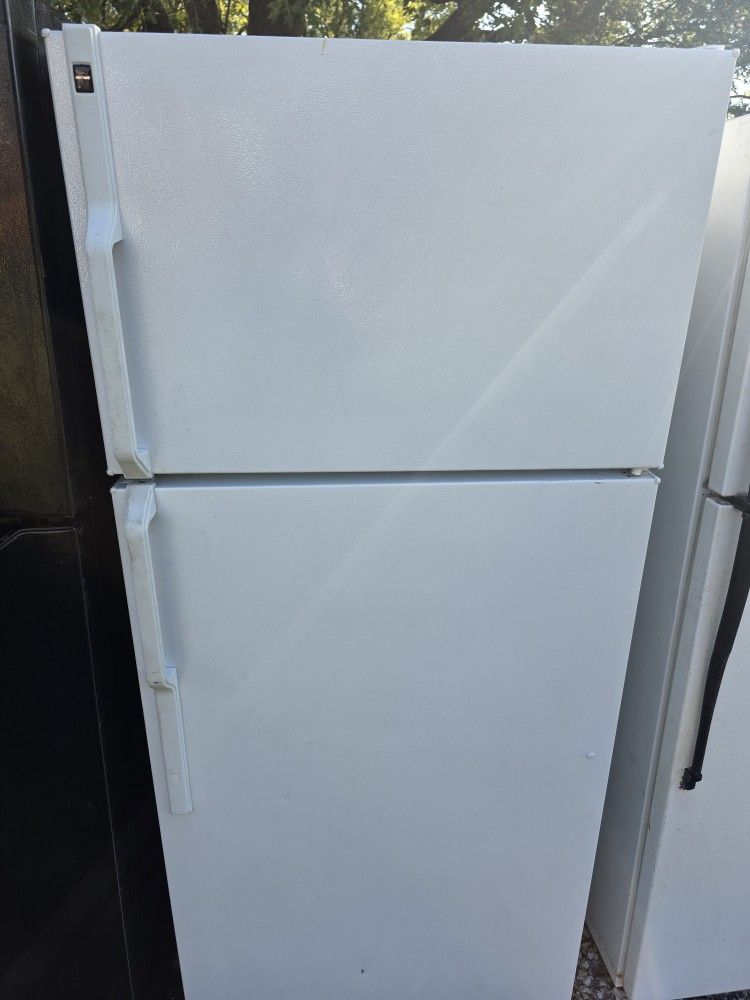 Hot point of freezer on top refrigerator on bottom