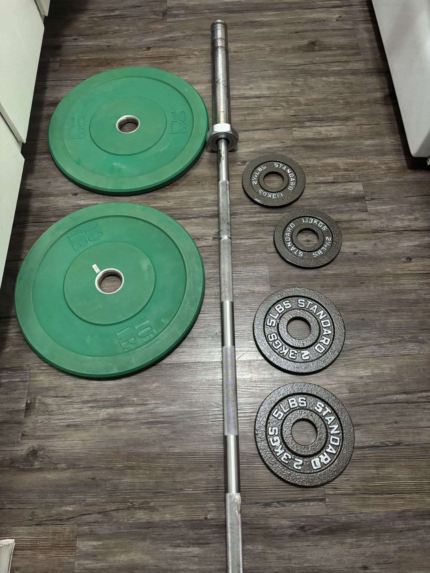 Iron Grip Barbell With Weights 2x10, 2x5 And 2x2.5 Lbs NOTE- One End Cap Missing On The Bar But Doesn’t Effect The Bar
