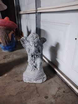 Cement angel statue