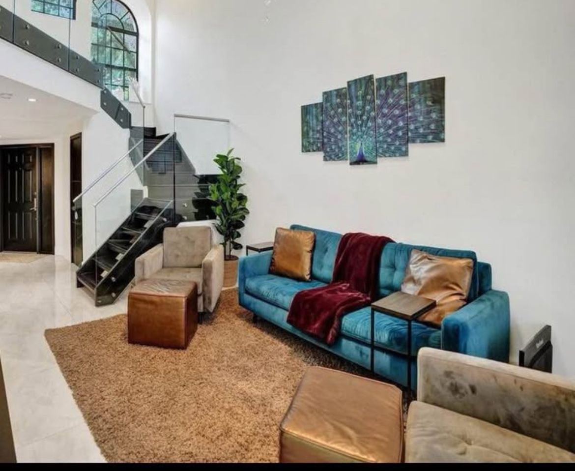 3 Seater Couch, 2 Chairs And Ottomans