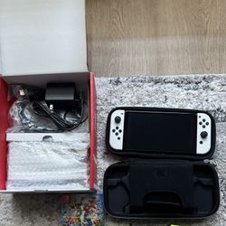Nintendo Switch OLED with Case and Game