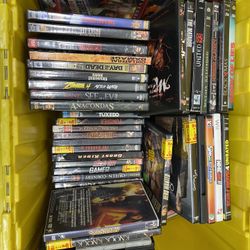 ****Box Of Assorted DVDs and Tablet Cases For Sale****