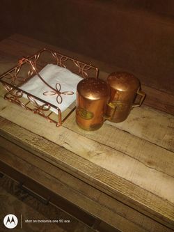 Capri salt and pepper shaker and matching napkin holder. $15 cash