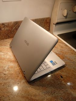 Asus 2 in 1 touchscreen laptop model Q304U