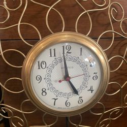 14inch 1960s vintage wall clock. Mid-century modern. Works! 55.00.  Johanna at Antiques and More. Located at 316b Main Street Buda. Antiques vintage r