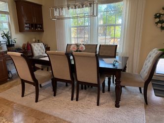 Table and chairs used but still has life in it